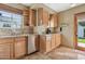 Cozy kitchen with stainless steel appliances and plenty of counter space for culinary enthusiasts at 1129 W Holly St, Phoenix, AZ 85007