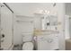 Bathroom with a vanity sink, white fixtures, and shower at 11451 S Half Moon Dr, Phoenix, AZ 85044