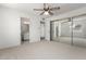 Bedroom with neutral carpet and ensuite bathroom at 11451 S Half Moon Dr, Phoenix, AZ 85044