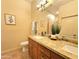 Bathroom featuring double sinks, granite countertops, and stylish fixtures at 11640 N Tatum Blvd # 3074, Phoenix, AZ 85028