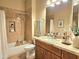 Bright bathroom featuring a shower/tub combination, granite countertops, and decorative touches at 11640 N Tatum Blvd # 3074, Phoenix, AZ 85028