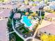 Resort-style pool with palm trees, lush landscaping, and plenty of seating at 11640 N Tatum Blvd # 3074, Phoenix, AZ 85028