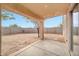 The backyard has a large covered patio and block wall at 11765 W Maui Ln, El Mirage, AZ 85335