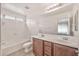 Bathroom featuring double sinks, ample counter space and a shower-tub combo at 11765 W Maui Ln, El Mirage, AZ 85335