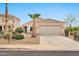 Charming single-story home featuring desert landscaping and a spacious two-car garage at 11765 W Maui Ln, El Mirage, AZ 85335