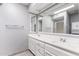 Bright bathroom boasts double sinks, ample counter space, and large mirrors at 120 E Calavar Rd, Phoenix, AZ 85022