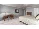 Bedroom featuring soft carpet, neutral walls, and closet at 120 E Calavar Rd, Phoenix, AZ 85022