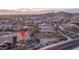 Aerial view of the home highlighting the backyard pool, patio, and surrounding desert landscape at 12231 S 185Th Ave, Goodyear, AZ 85338