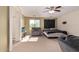 Spacious bedroom featuring neutral walls, carpet, a ceiling fan, and furniture at 12509 W Whyman St, Avondale, AZ 85323