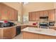 Bright kitchen featuring an island and natural light at 12509 W Whyman St, Avondale, AZ 85323