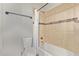 Bathroom features a tiled shower/bath combo, neutral color palette, and classic fixtures at 1409 E Verlea Dr, Tempe, AZ 85282