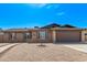 Charming single-story brick home featuring a low maintenance front yard and attached two car garage at 1409 E Verlea Dr, Tempe, AZ 85282