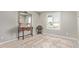 Living Room with light walls, shuttered window, rug, mirror and decorative tables at 1409 E Verlea Dr, Tempe, AZ 85282