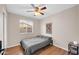 Bedroom featuring a ceiling fan and natural light to enjoy at 1430 W Rockwood Dr, Phoenix, AZ 85027