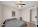 Bright bedroom featuring a ceiling fan, and natural light at 1430 W Rockwood Dr, Phoenix, AZ 85027