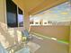 Relaxing balcony features comfortable seating and views of the beautiful desert surroundings at sunset at 145 N 74Th St # 256, Mesa, AZ 85207