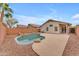 Backyard with pool, desert landscaping, privacy fence, and outdoor living spaces at 16611 N 19Th St, Phoenix, AZ 85022