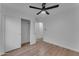 Clean bedroom with sliding closet door and ceiling fan at 16611 N 19Th St, Phoenix, AZ 85022