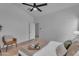 Modern bedroom featuring a ceiling fan, neutral colors and wood flooring at 16611 N 19Th St, Phoenix, AZ 85022