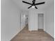 Bright, airy bedroom featuring modern ceiling fan, neutral decor and wood-look floors throughout at 16611 N 19Th St, Phoenix, AZ 85022