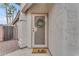 Inviting front door adorned with a seasonal wreath and a welcoming 'hello' doormat at 16611 N 19Th St, Phoenix, AZ 85022