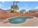 Backyard with pool featuring desert landscaping and privacy fence at 16611 N 19Th St, Phoenix, AZ 85022