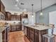 Spacious kitchen with stainless steel appliances and granite countertops at 18556 W Vogel Ave, Goodyear, AZ 85338