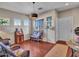 Comfortable living room with a reading nook with natural light at 18556 W Vogel Ave, Goodyear, AZ 85338