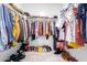 Walk-in closet providing ample storage space for clothes, shoes, and accessories at 21743 N Daniel Dr, Maricopa, AZ 85138