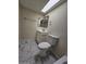 Well-lit bathroom features a modern vanity and stylish marble-patterned tile flooring at 2255 W Bloomfield Rd, Phoenix, AZ 85029