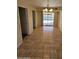 The dining area has tile floors and a light fixture with a view of the outside swimming pool at 2255 W Bloomfield Rd, Phoenix, AZ 85029