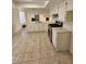 Bright kitchen featuring light countertops, white cabinetry, and stainless steel appliances at 2255 W Bloomfield Rd, Phoenix, AZ 85029