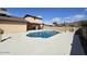 Beautiful backyard featuring a pool, diving board, and outdoor BBQ area at 2255 W Bloomfield Rd, Phoenix, AZ 85029