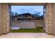 Backyard features a stone privacy wall and water feature at 23880 N 127Th St, Scottsdale, AZ 85255