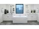 Bathroom features double sinks, large tub and updated neutral finishes at 23880 N 127Th St, Scottsdale, AZ 85255