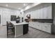 Well-designed kitchen featuring ample cabinet space, a large island, and sleek stainless steel appliances at 23880 N 127Th St, Scottsdale, AZ 85255