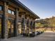 Stunning stone patio with comfortable seating offering picturesque views of the surrounding landscape at 23880 N 127Th St, Scottsdale, AZ 85255