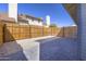 Private backyard with block-paved patio and wooden fence for outdoor entertaining at 2455 E Broadway Rd # 102, Mesa, AZ 85204