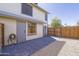 Enclosed backyard with paved patio, providing a great space for outdoor relaxation at 2455 E Broadway Rd # 102, Mesa, AZ 85204