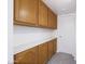 Pantry area with plentiful shelving and cabinet space for organized storage at 2455 E Broadway Rd # 102, Mesa, AZ 85204