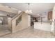 Bright dining area featuring tile flooring and views of the kitchen and stairs at 2546 E Camellia Dr, Gilbert, AZ 85296