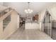 Open dining room with tiled floors, a chandelier, and sliding door access to the patio at 2546 E Camellia Dr, Gilbert, AZ 85296