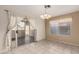 Dining area with tile floors, a view to the patio, and natural light through windows at 2546 E Camellia Dr, Gilbert, AZ 85296