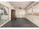 Covered patio with ceiling fan, screened windows, storage cabinet, and tile flooring at 2546 E Camellia Dr, Gilbert, AZ 85296