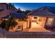 Backyard with patio including outdoor kitchen, dining area and adjacent seating at 2678 S 172Nd Dr, Goodyear, AZ 85338