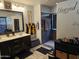 Bathroom featuring dual sink vanity and tiled walk-in shower at 2678 S 172Nd Dr, Goodyear, AZ 85338