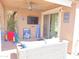 Outdoor patio with tv and lounge area at 2678 S 172Nd Dr, Goodyear, AZ 85338