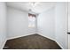 A cozy bedroom features neutral walls, plush carpet, and a bright window at 2741 E Bridgeport Pkwy, Gilbert, AZ 85295