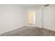 Neutral bedroom with carpeting, closet and view to another room at 3001 E Amber Ridge Way, Phoenix, AZ 85048