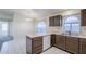 Efficient kitchen boasts ample counter space, and an open-concept layout into the living room at 3001 E Amber Ridge Way, Phoenix, AZ 85048